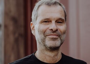 Headshot of Claus Neuberger